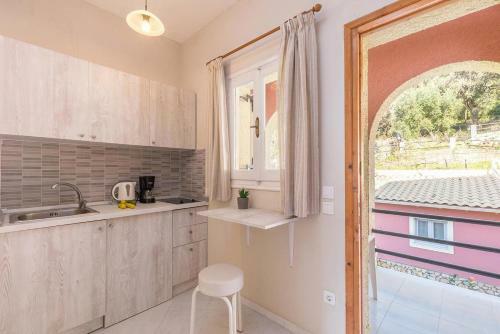 Escape Studio Apartments With Swimming Pool On Pelekas Beach