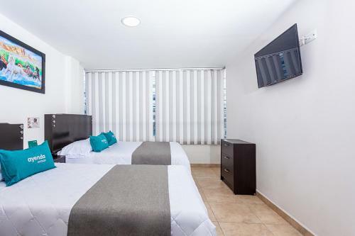 Hotel Ayenda Agustin Plaza