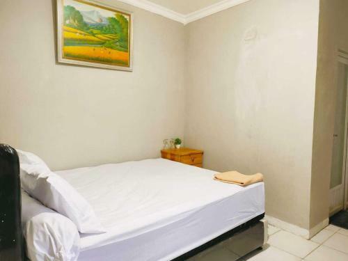 Hotel Express O 91277 Atiq Homestay Syariah
