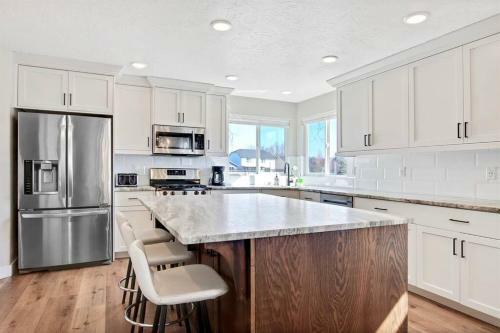 The White Custom Farmhouse 5 Bedroom Home