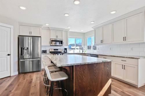 The White Custom Farmhouse 5 Bedroom Home