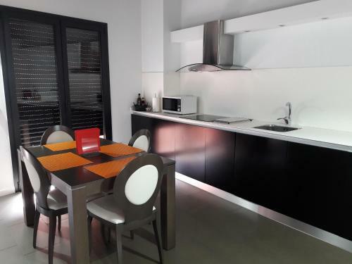 Apartaments Y Habitacions Entre Volcans