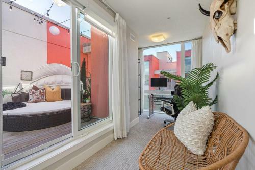 The Noma I Private Rooftop Patio I Marda Loop I Tv
