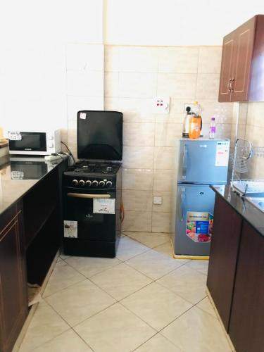 Apartamento Amani Homes 7