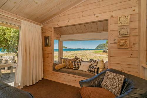 Absolute Beachfront Bach - Pauanui Holiday Home
