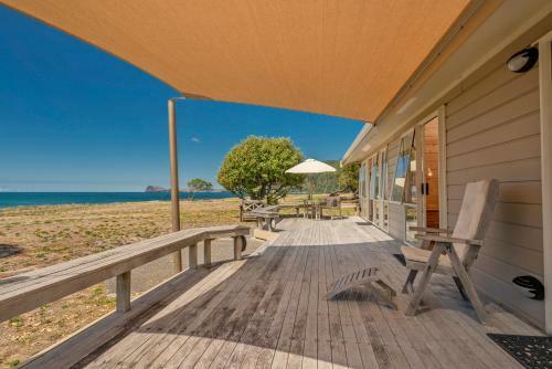 Absolute Beachfront Bach - Pauanui Holiday Home
