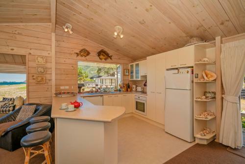 Absolute Beachfront Bach - Pauanui Holiday Home
