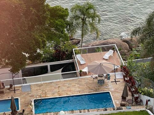 Apartamento Apto A Beira-mar Com Piscina Em Martim De Sa Sp