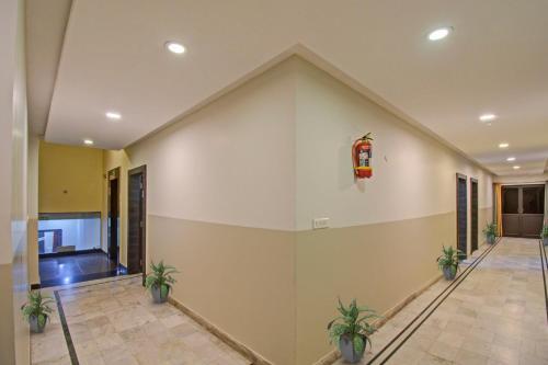 Capital O 91036 Hotel Stanza