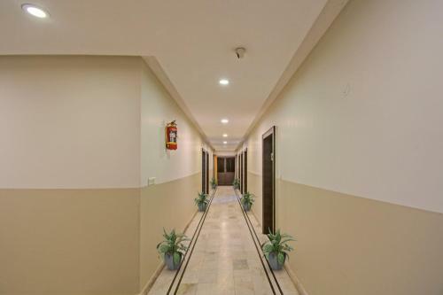 Capital O 91036 Hotel Stanza