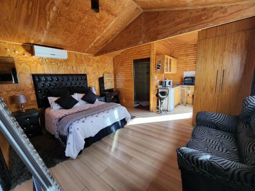 The Log Cabin Apartments Hotel