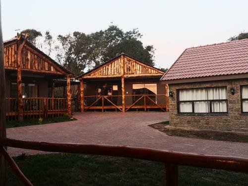 The Log Cabin Apartments Hotel