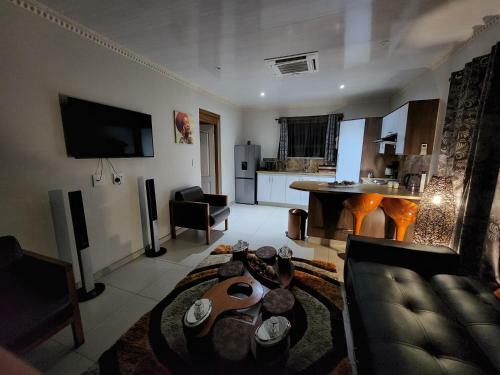 The Log Cabin Apartments Hotel