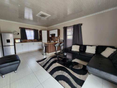 The Log Cabin Apartments Hotel