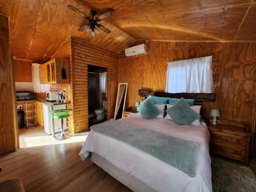 The Log Cabin Apartments Hotel