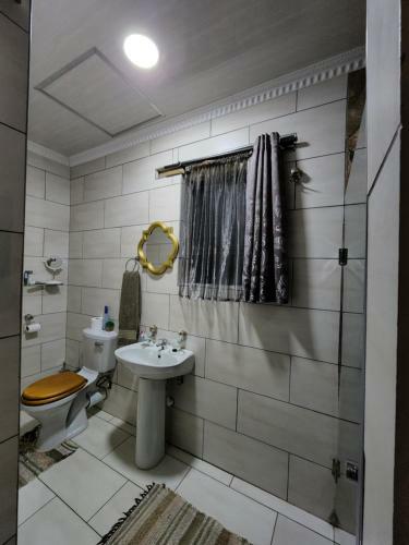 The Log Cabin Apartments Hotel
