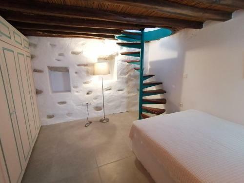 Traditional House In A Settlement In Paros