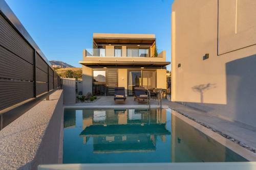 Villa Paligremnos Residences, A Beachside Retreat!