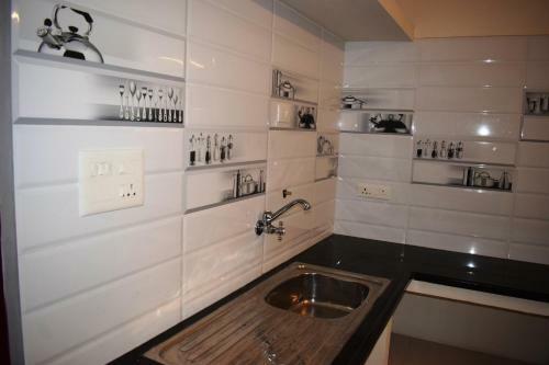 Apartamento White Tulip Residency