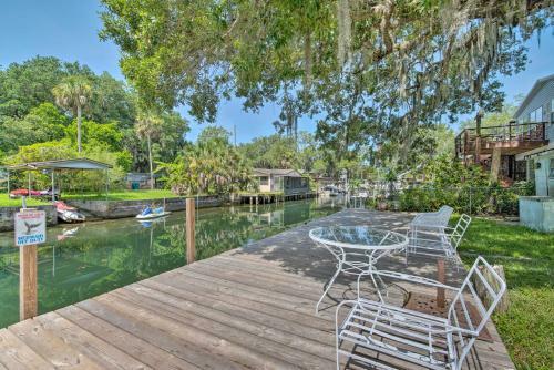 Canal-front Barefeet Retreat Dock And Kayaks
