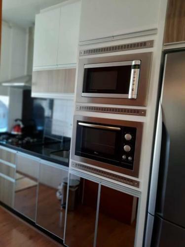 Apartamento Condom�nio Super Agrad�vel Com Garagem Privativa