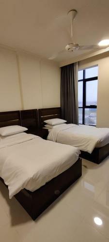 Apartamento Al Noor Suites