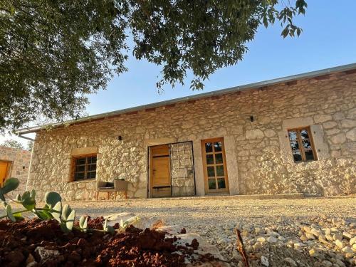 Kostela Stone House