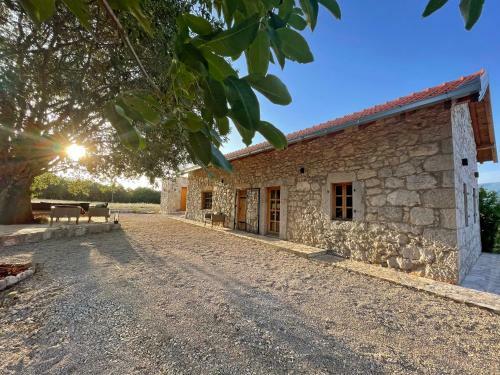 Kostela Stone House