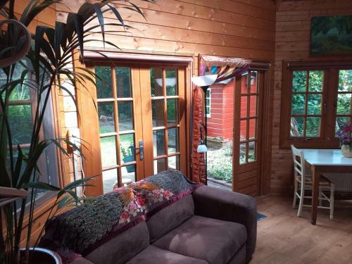 Bed & Breakfast De Geheime Tuin - Boshuis