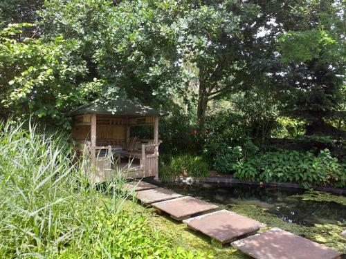 Bed & Breakfast De Geheime Tuin - Boshuis