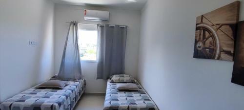 Casa Na Orla, Massagu�u