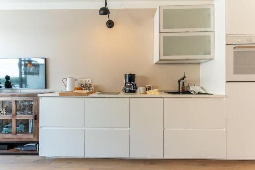 Apartamento Haus-steinwarder-7-wohnung-strandbude-18