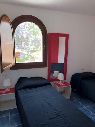 Casa Vacanze Gli Oleandri Rossi