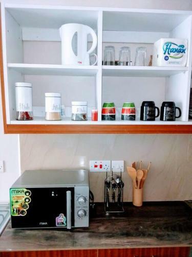 Apartamento Waridi Studio- Wi-fi, Netflix,pool,parking&view
