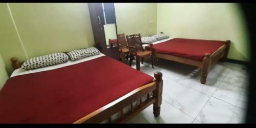 Albergue Hotel Santhosh