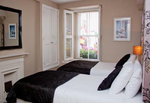 Hostal 7 Cross Street Boutique Townhouse
