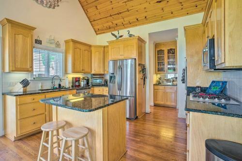 Elegant Waterfront Home With Bar, Deck And Views!