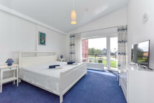 Kotedzas Sventojoje 11 Gulbiu