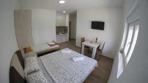 Apartmani Tom