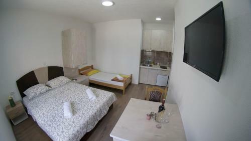 Apartmani Tom