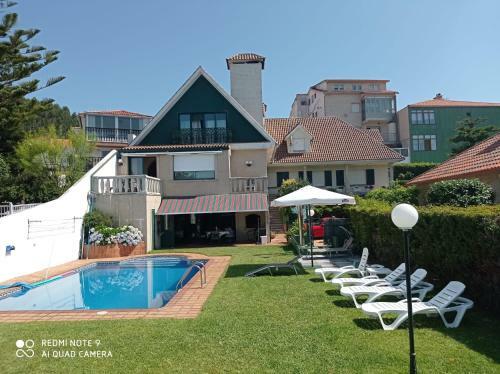 Playa Sin�s Beach. A Pie De Playa. Raxo-sanxenxo.
