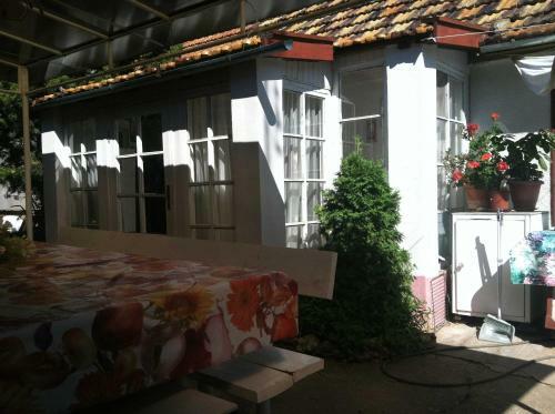 House With Flowers
