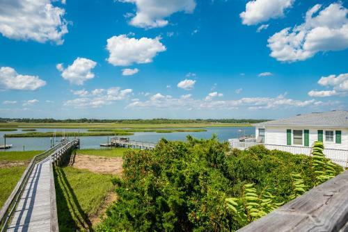 Two Buoys And A Gull By Oak Island Accommodations