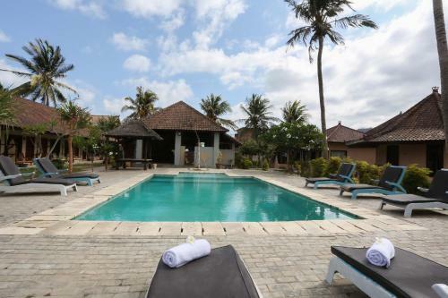 Collection O 1651 Purnama Beach Hotel