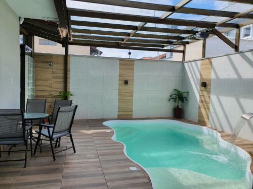 Sobrado Com Piscina Aquecida A Poucos Metros Mar