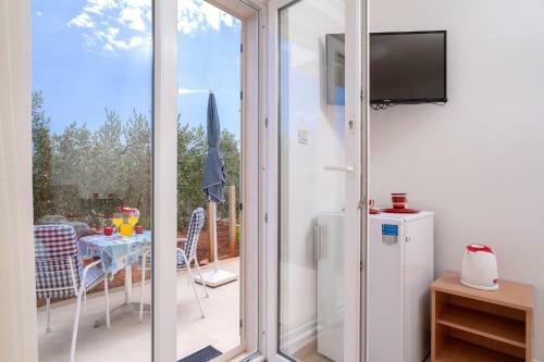 Hostal Rooms & Studio Villa Fio