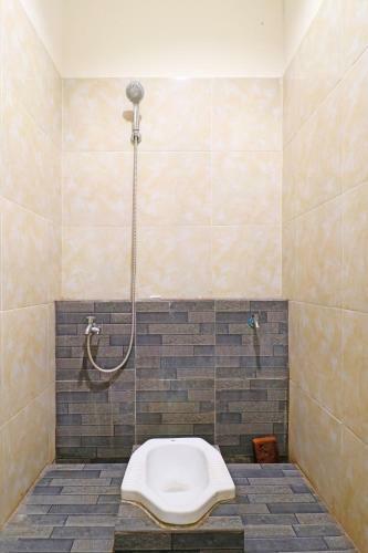 Hotel Spot On 91504 De Vila Ungu Syariah