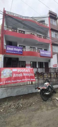 Spot On 91567 Hotel Amoli Heights