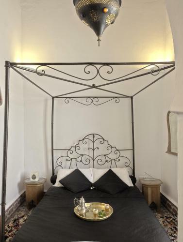Riad Mala�ka