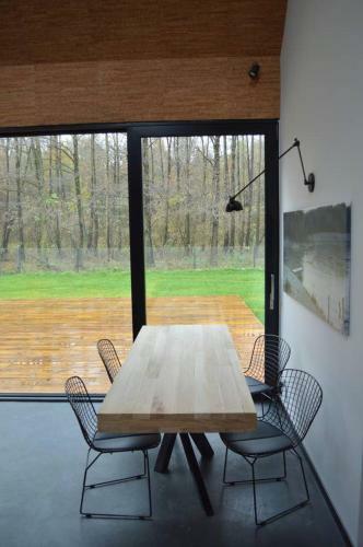 Villa Modern House In Front Of The Forest